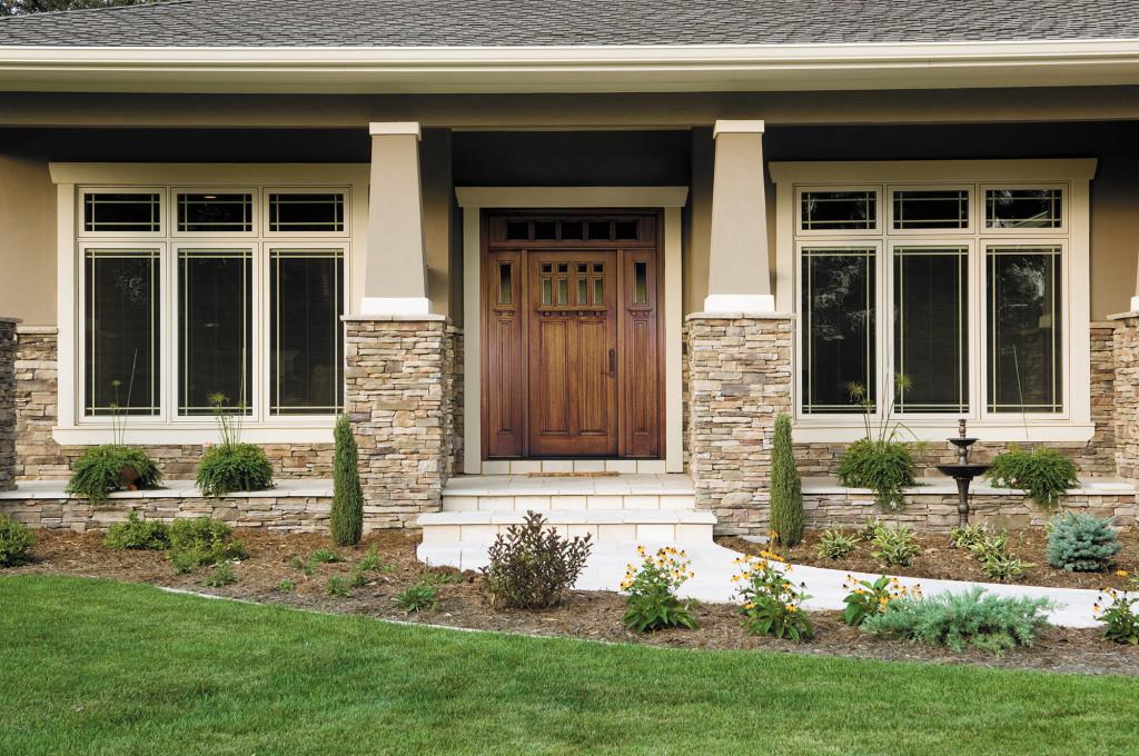 Craftsman-style entry door on a traditional home